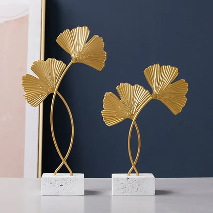 Golden leaf figurines