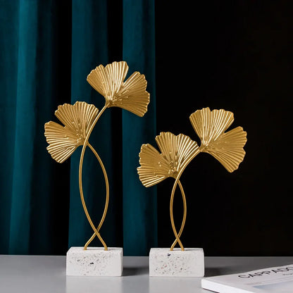 Golden leaf figurines