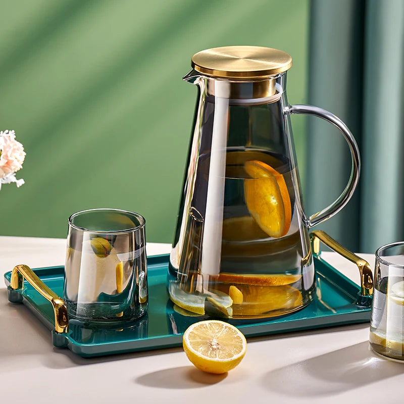 Large heat-resistant glass jug with a transparent handle