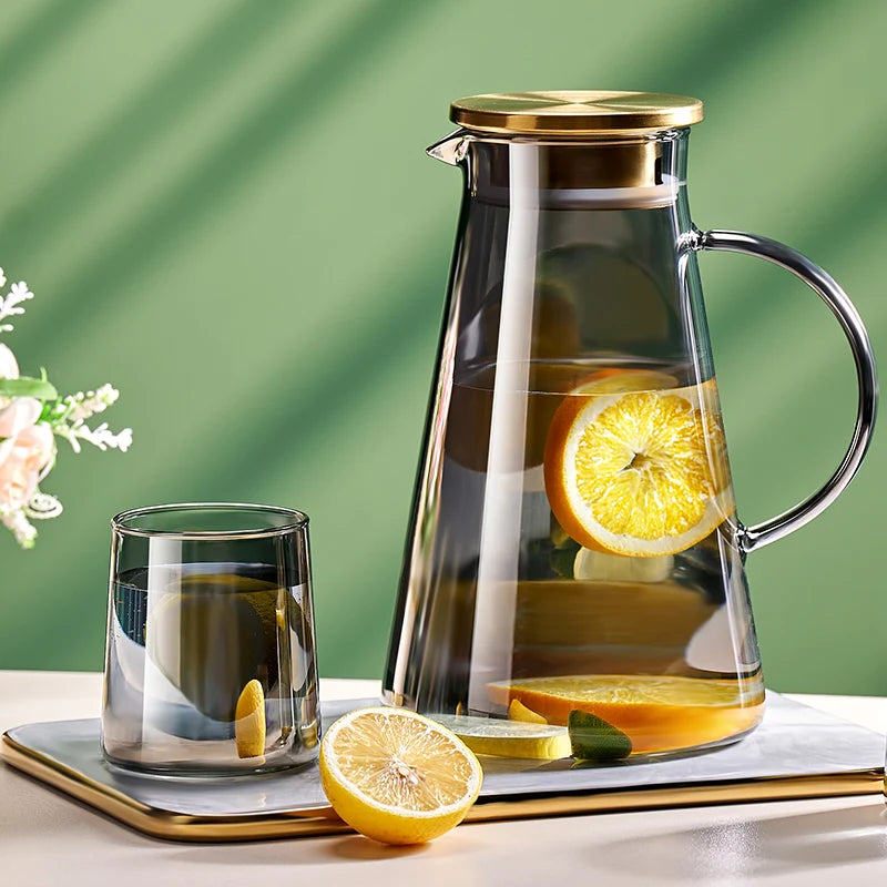 Large heat-resistant glass jug with a transparent handle