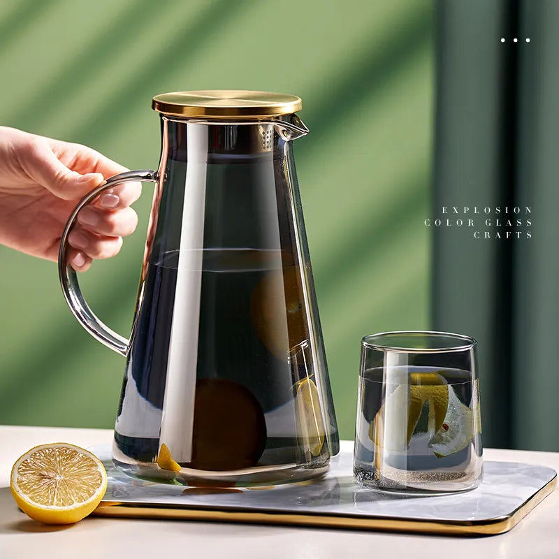 Large heat-resistant glass jug with a transparent handle