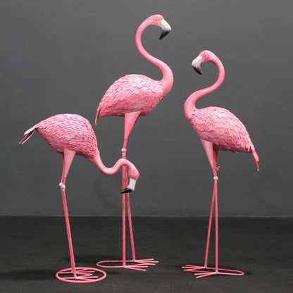 3 metal flamingo sculptures in 3 sizes for your garden