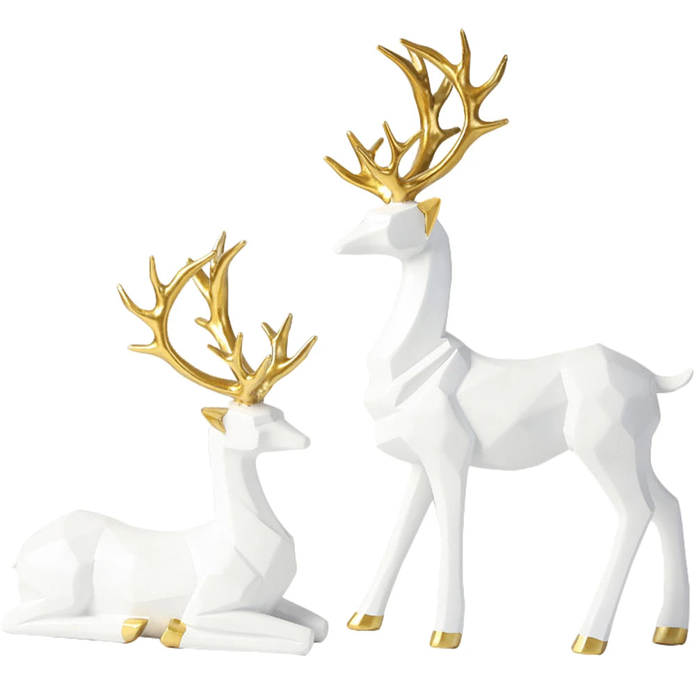 Two resin elk ornaments with origami design