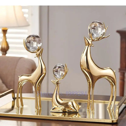 Gold deer ornaments set with a crystal ball