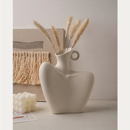 Modern ceramic hollow vase with clavicle-shaped