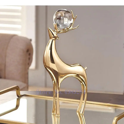 Gold deer ornaments set with a crystal ball