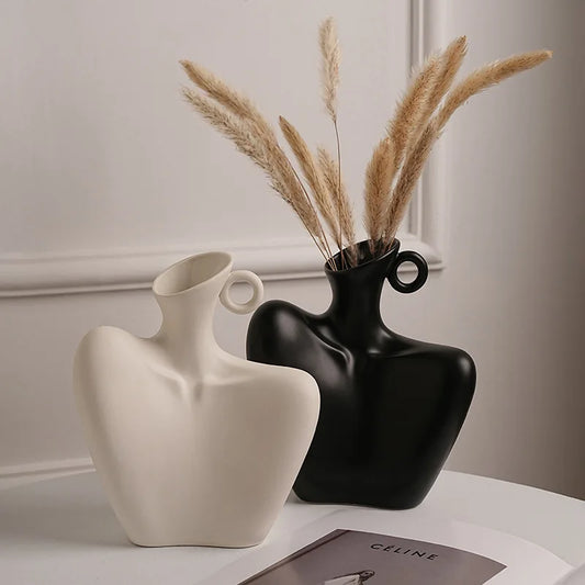 Modern ceramic hollow vase with clavicle-shaped