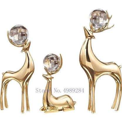 Gold deer ornaments set with a crystal ball